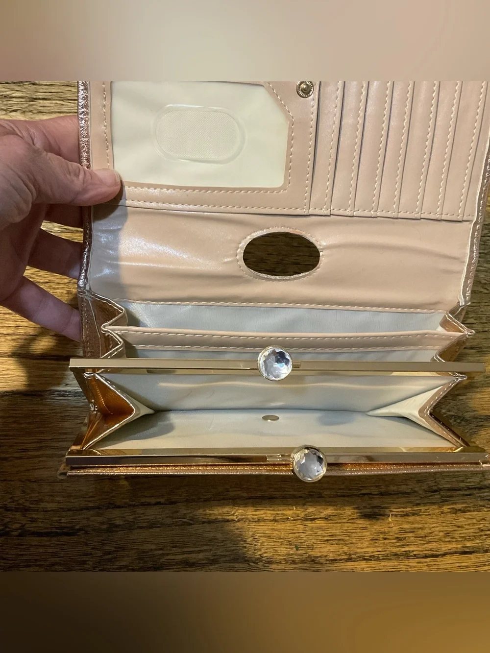 Metallic rose gold wallet with faux diamond clasp, EUC
